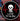 A circular black sticker or decal with a white skull, red heartbeat line, and the text 'LIVE Til Ya Die' is shown against a colorful graffiti wall.